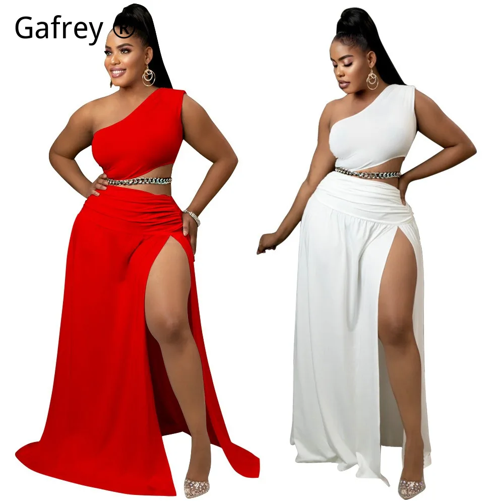 

Новый комплект из двух предметов больших размеров 2026: женский однотонный топ на одно плечо с открытыми плечами и облегающая юбка с разрезом. Сексуальный и элегантный комплект для вечеринок и выходов в свет.