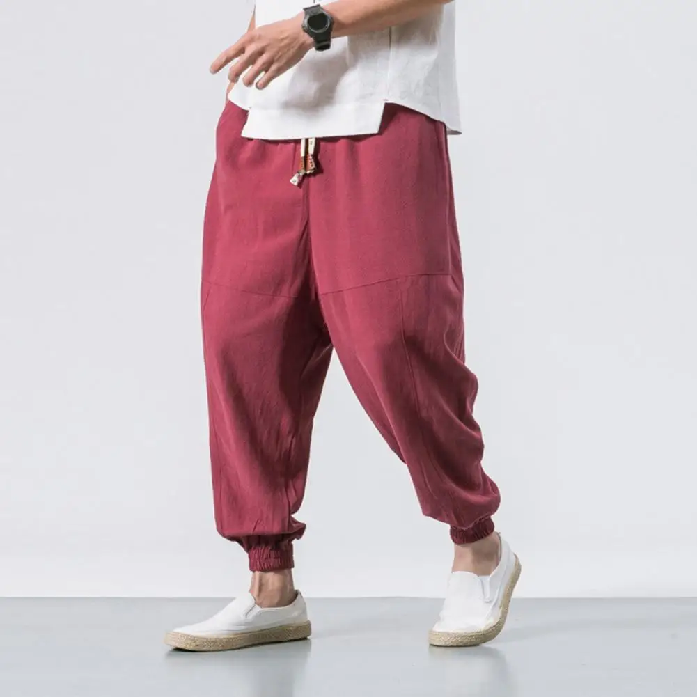 Pantalones bombachos de algodón para hombre, ropa de calle de cintura elástica sólida, estilo japonés, holgados, hasta el tobillo, con bolsillos