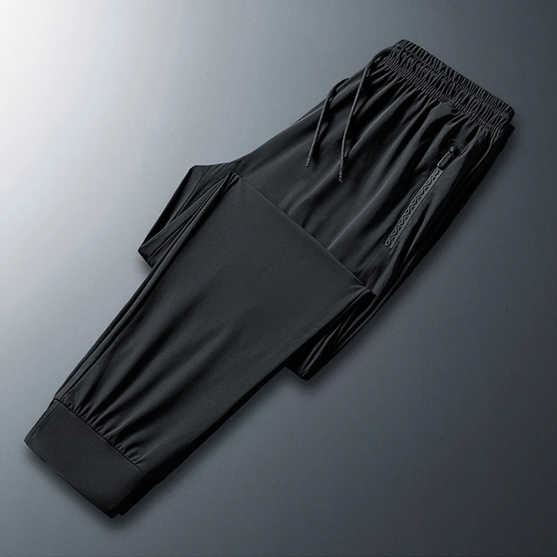 2024 Men\'s Versatile Stretch Quick Drying Pants Zipper Pocket Designer Casual Trousers Breathable Outdoor Joggers Summer Pants