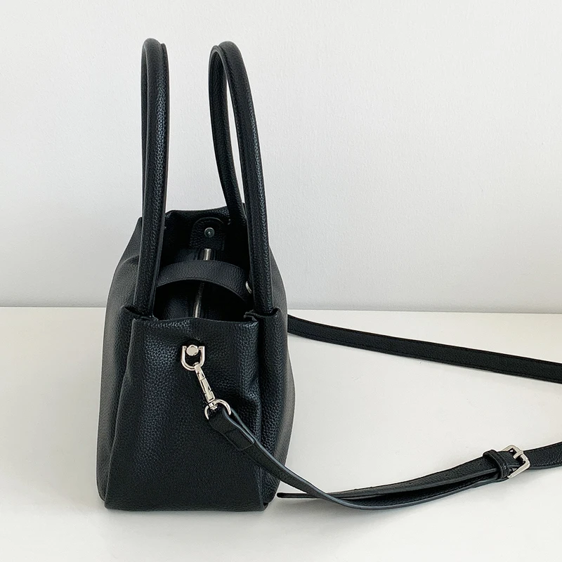 حقائب نسائية كورية كاجوال فاخرة بتصميم جديد لعام 2026، مصنوعة من مادة البولي يوريثان، بنمط الليتشي، مع جيب داخلي وحقيبة كتف بمقبض علوي جودة عالية ًالشحن مجانا وصول الشحن السريع