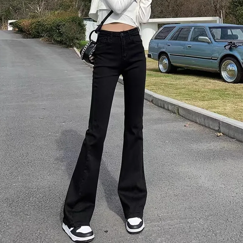 กางเกงยีนส์ทรงบานเอวสูงสไตล์วินเทจสำหรับผู้หญิง ปี 2025 กางเกงขากระดิ่งยืดหยุ่นสำหรับผู้หญิง กางเกงยีนส์สีพื้นสำหรับผู้หญิง สไตล์ลำลอง