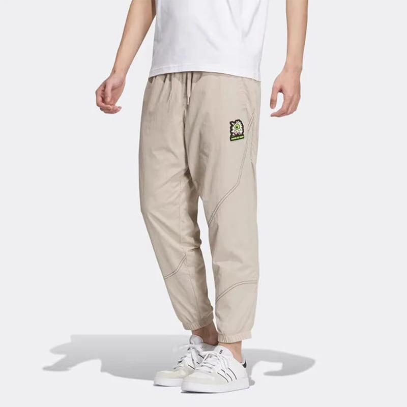

Adidas TRACK PANT Lightweight Cargo Pants, Versatile & Long-lasting for Urban Adventures and Casual Strolls