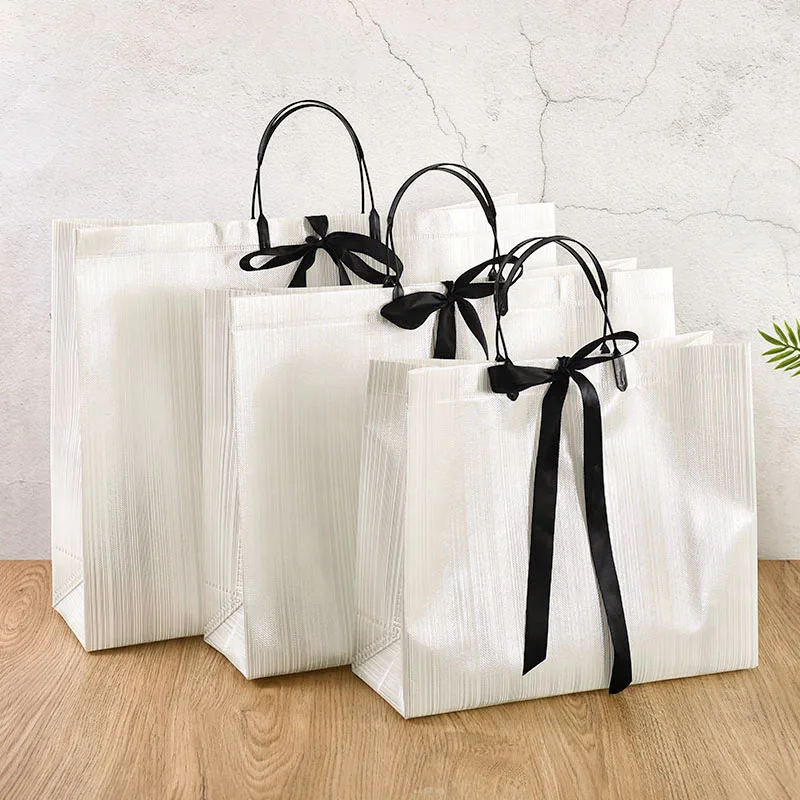 1pc Gift Packaging White Non-woven Bag With Black Border Shopping Bags Portable Tote Bags Bow Ribbon Dinner Party Supplies