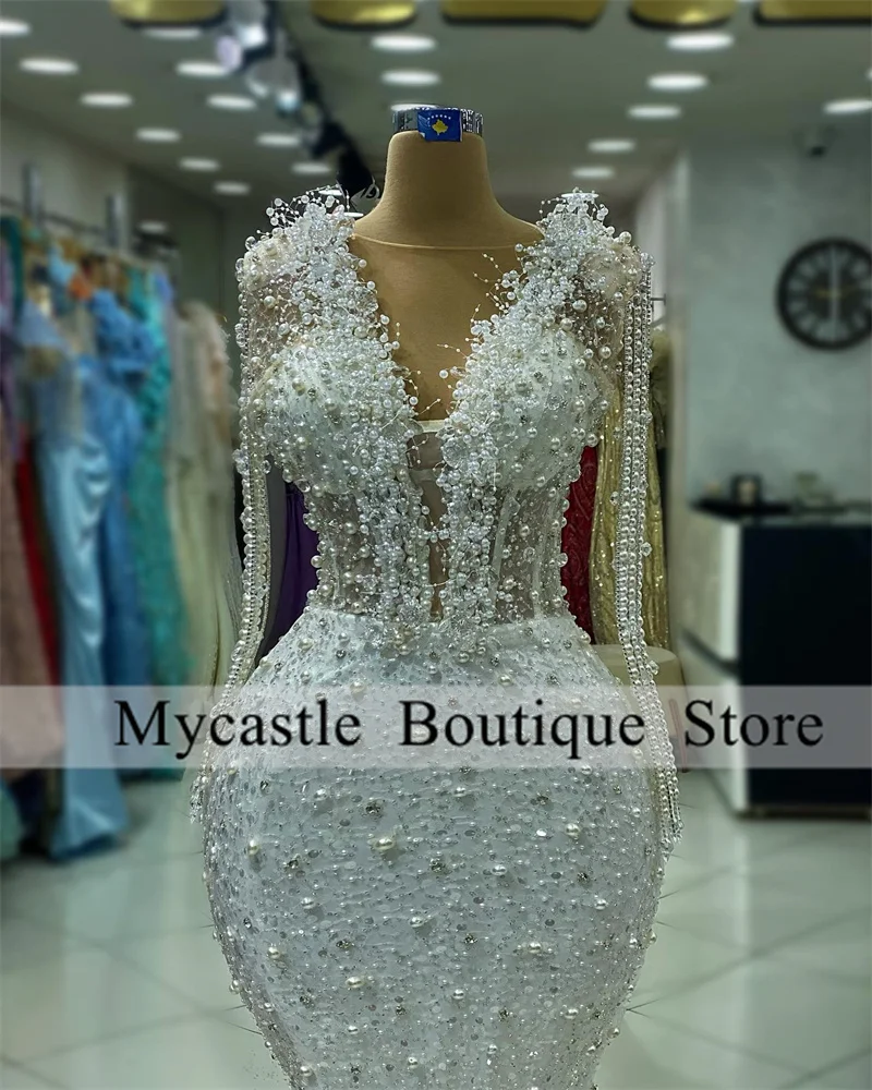 فساتين سهرة فاخرة بحورية البحر مطرزة باللؤلؤ الأبيض للنساء 2025 شرابات بطول الأرض للحفلات الراقصة فستان حفلات الزفاف حسب الطلب