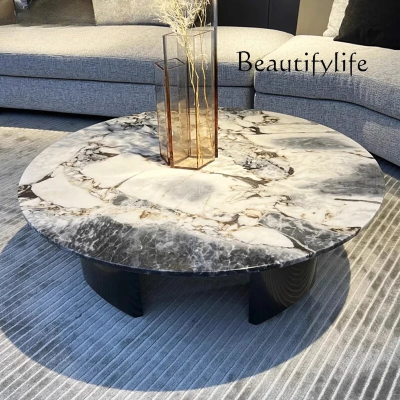 

Italian natural luxury stone elephant white coffee table modern simple high-end living room round coffee table ocean storm