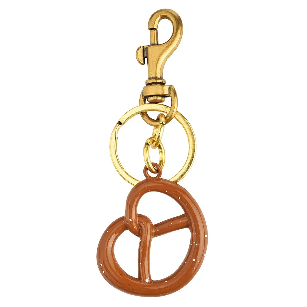 Borse di marca alla moda, biscotti, ciondoli, bestseller per auto, portachiavi e lussuosi ciondoli ad anello portachiavi