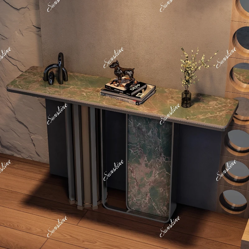 Italian light luxury stainless steel console table against the wall to enter the door directly opposite the door