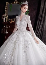 Long-sleeved main wedding dress 202021 new temperament bride summer deep v-neck big tail high-end palace style