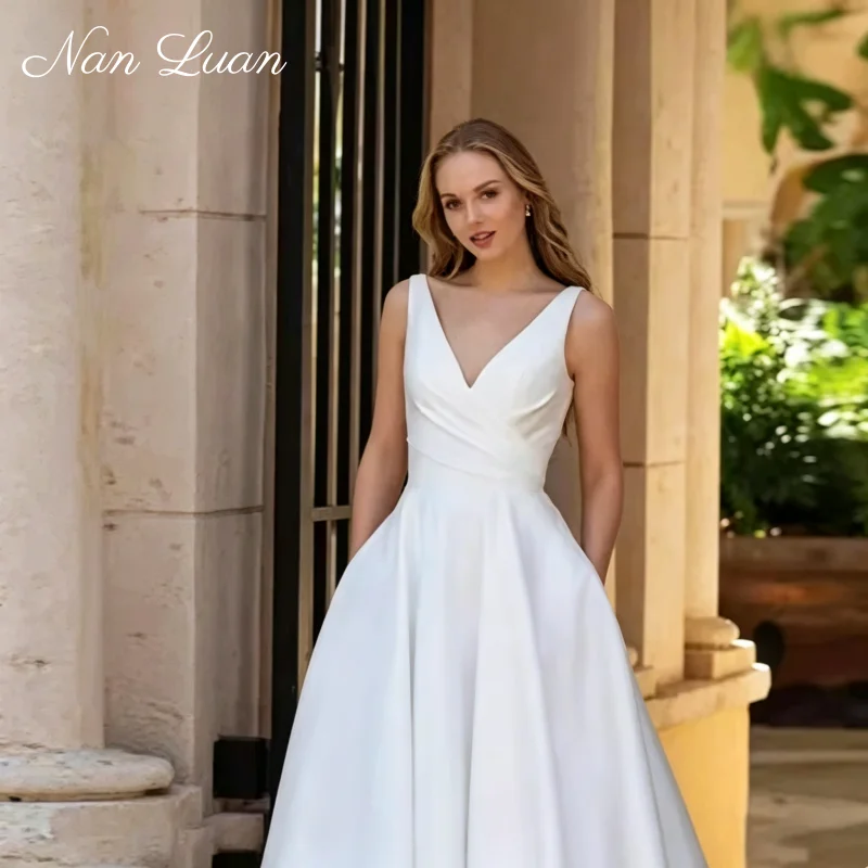 2026 V-Ausschnitt Satin A-Linie Hochzeitskleid mit Taschen Vestidos de Novia Maßgeschneidert