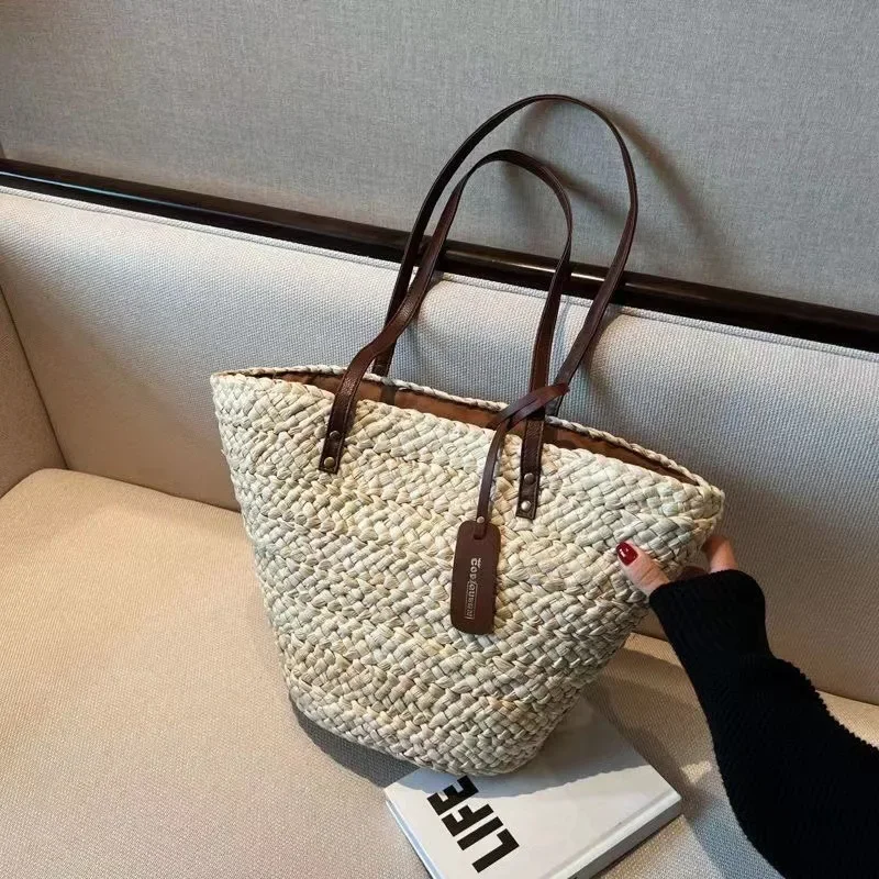 

2025 New French Style Handmade Corn Straw Woven Tote Bag Women Large Capacity Beach Basket Purse Boho Retro Shoulder Bag​