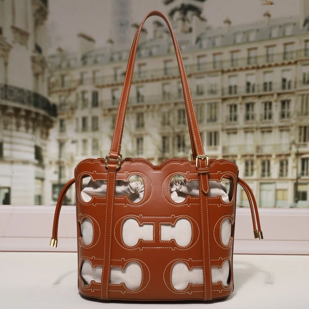 

Perforated Letter Bucket Bag, Premium Leather Shoulder Bag for Women, Designer Top-Handle Purse, Modern & Stylish Daily Bag