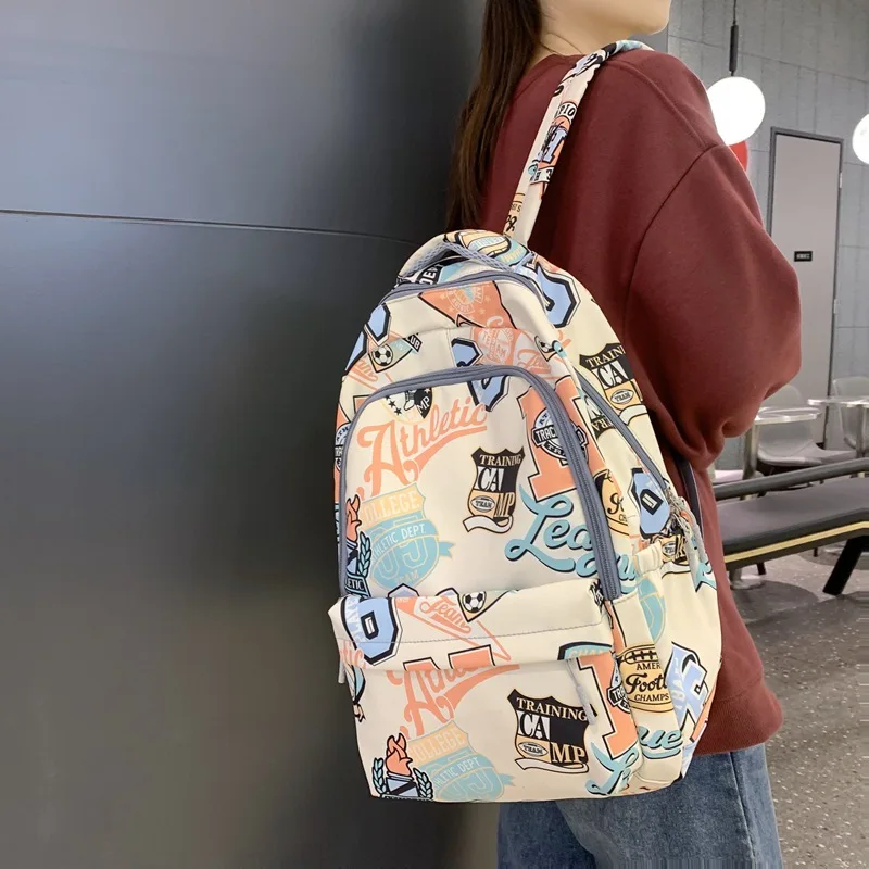 Zaino doppio di tendenza muslimtrend da uomo e da donna di marca originale di grande capacità Graffiti Mochilas Para Mujer vendita calda