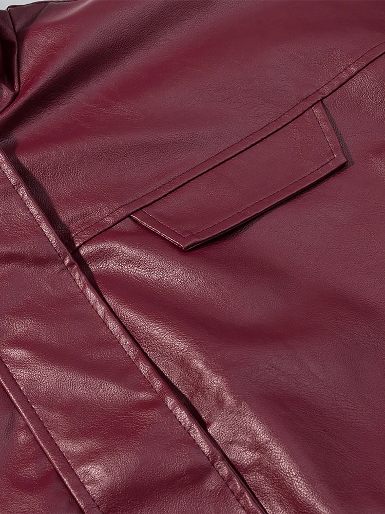 Nouvelle veste en cuir ample à col haut de couleur unie pour femmes de style européen à la mode et polyvalente avec détails de poche.
