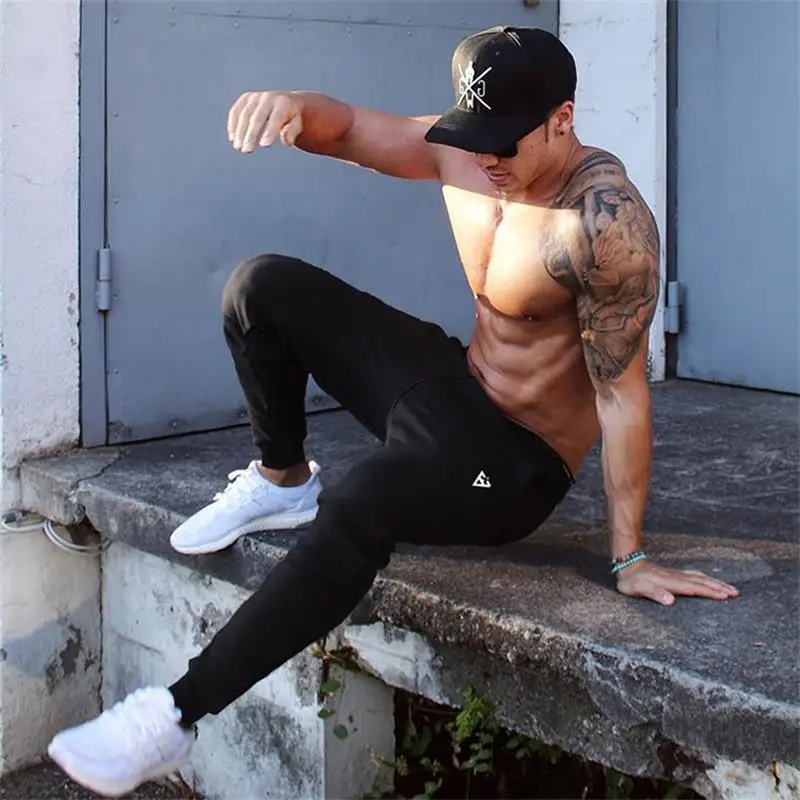 Muscle thin fitness pants running sports training elastic slim fit closed leg pants joggers men