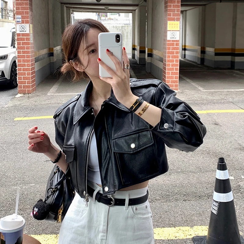 ربيع المرأة الكورية ضئيلة قصيرة فو بولي Leather سترة جلدية الشارع الشهير موضة التلبيب جيوب كبيرة طويلة الأكمام الإناث السائق سترة معطف