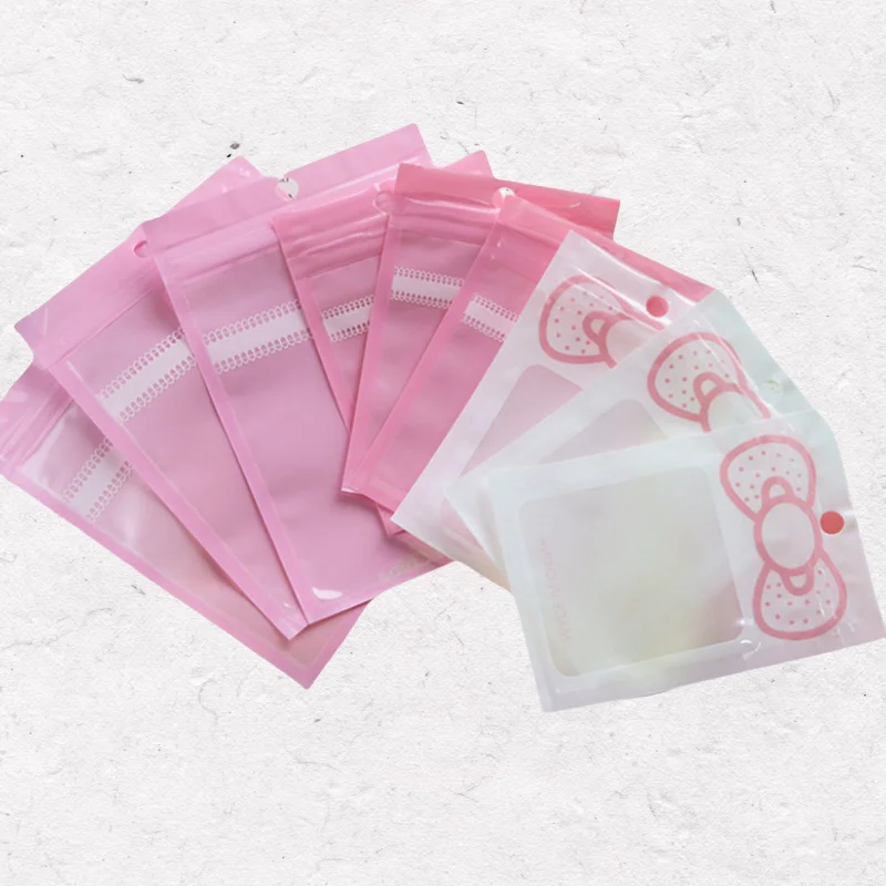 50 Stück/Lot Rosa Transparente Mylar-Ziplock-Beutel mit Schleife Wiederverschließbare Ornament-Aufbewahrungsbeutel für Süßigkeiten, Kekse, Geschenke und Verpackungen – Detail 2