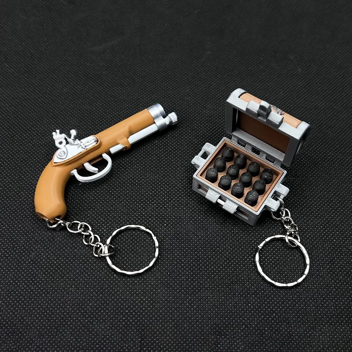 

Hot Selling 3D Printed Mini Pirate Finger Gun Keychain Launchable Balls Magazine Drum Bag Pendant Fidget Stress Relief Toy Gifts