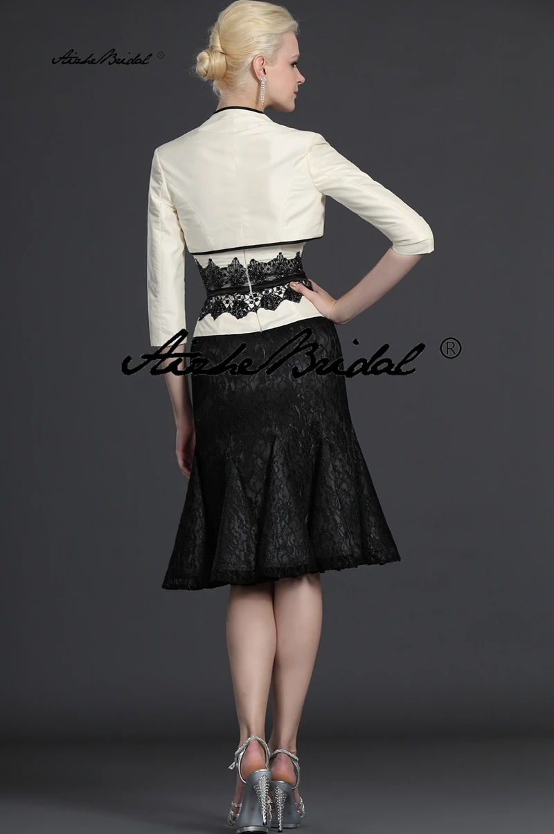 فستان حفلات الزفاف فستان قصير لأم العريس بألوان متباينة عاجية وأسود بدون حمالات فستان أم العروس مع سترة #4