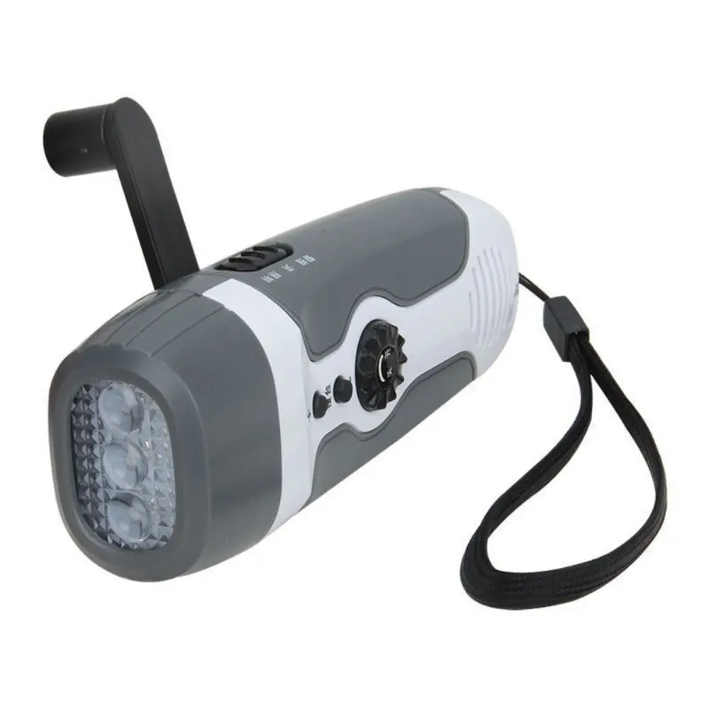 

Hand-held Hand-cranking Generation Multifunctional Flashlight USB LED Lights FM Radio Portable ABS Emergency Alarm Travel