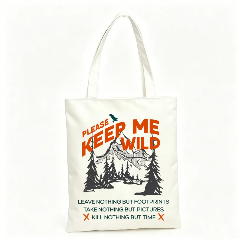 Outdoor enthusiasts' nature graphic canvas tote bag with slogan-style print, perfect for casual outings and eco-friendly