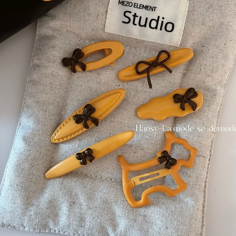 

Cute Yellow Brown Bow Hair Clips for Girls Women Side Bangs Barrettes Soft Non Slip No Crease Charming Daily Fashion Accessories