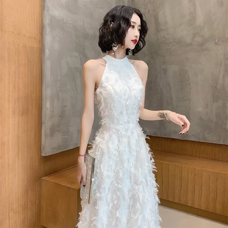 

A new light luxury and niche birthday party host dress with halter neck