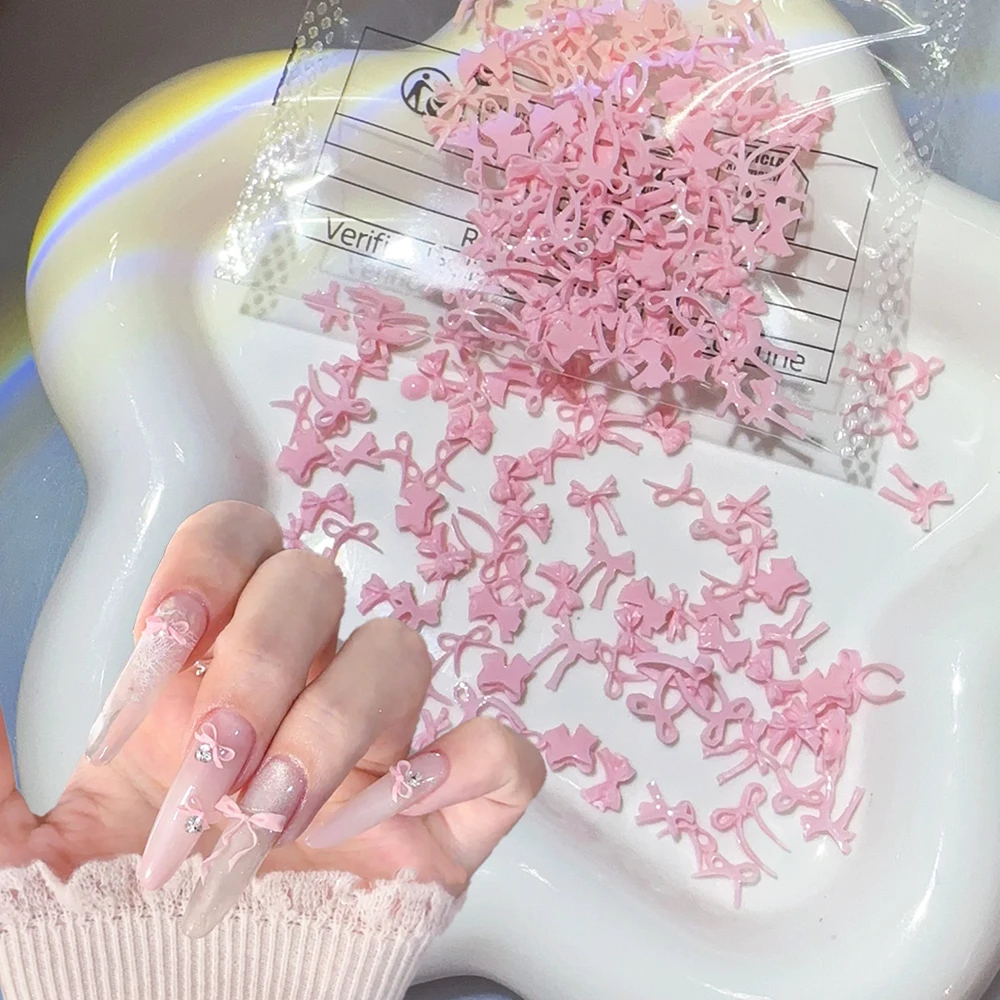 100 pezzi rosa mini bowknot nail art fascino dolce nastro bowknot design scavato nail art strass kawaii papillon manicure parte