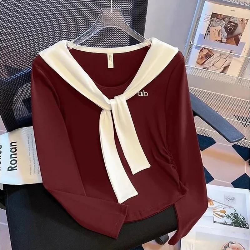 

Женская футболка с длинными рукавами и воротником-шаллю с завязками спереди и вышивкой, облегающий укороченный топ с рюшами