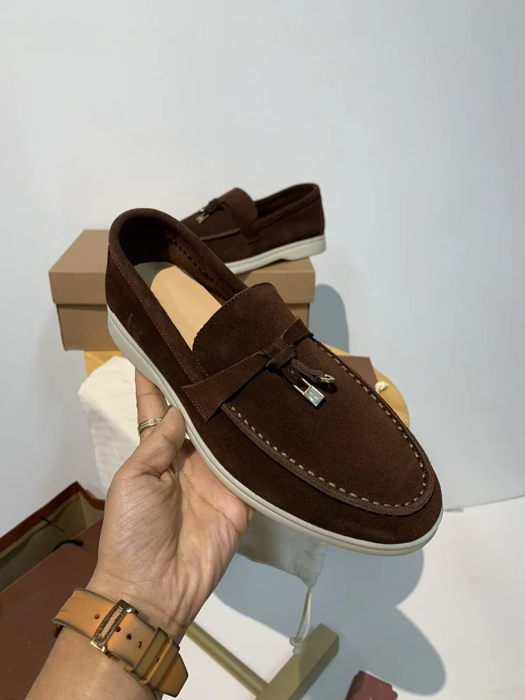 Mocasines informales de piel de ciervo de alta calidad para mujer, zapatos de suela plana con hebilla de borla, para caminar y conducir, novedad de verano