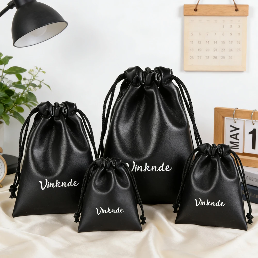 

Various Sizes Mini Drawstring Travel Storage Bag Gift Packing Bag Cool Black Custom Logo Small PU Leather Bag for Jewelry Soap