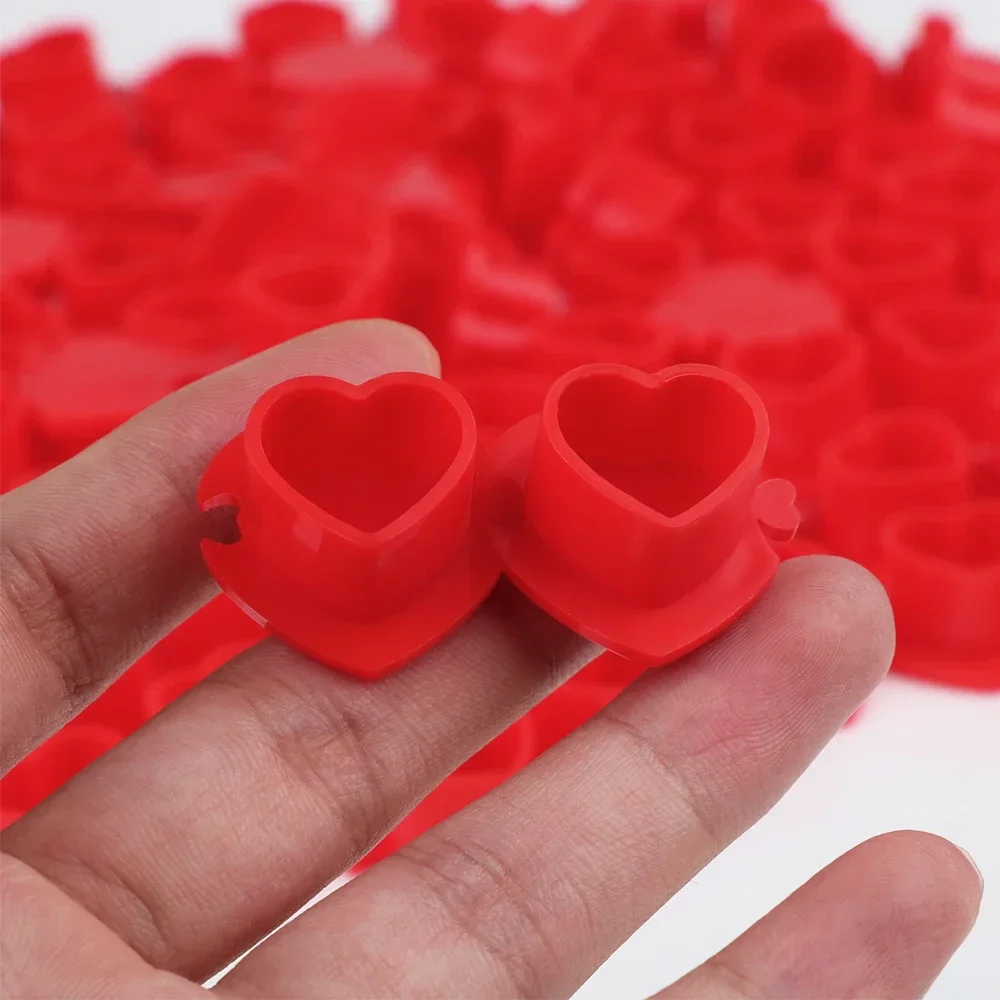 50PCS Heart-Shaped Tattoo Ink Cup Set Eco-Friendly Disposable Splicing Pigment Cap Tattoo Accessories Base