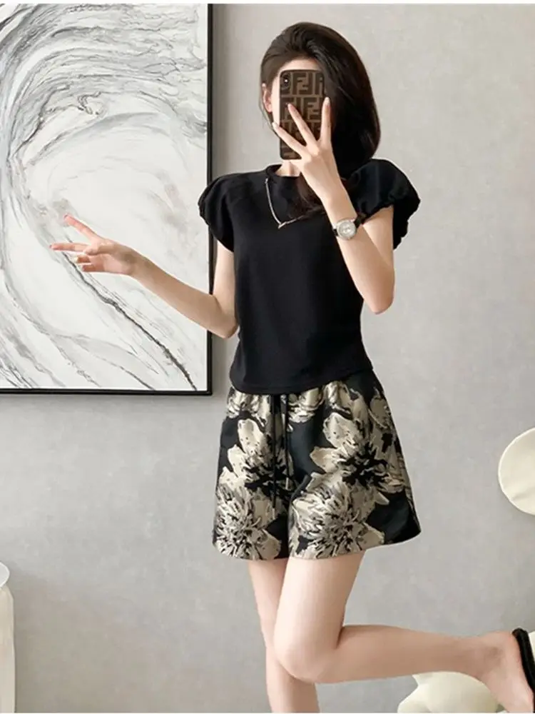 

Elegant Women's Two Piece Outfit Set Black Puff Sleeve Top Floral Print Shorts Summer Casual Fashion Ladies Clothing Set