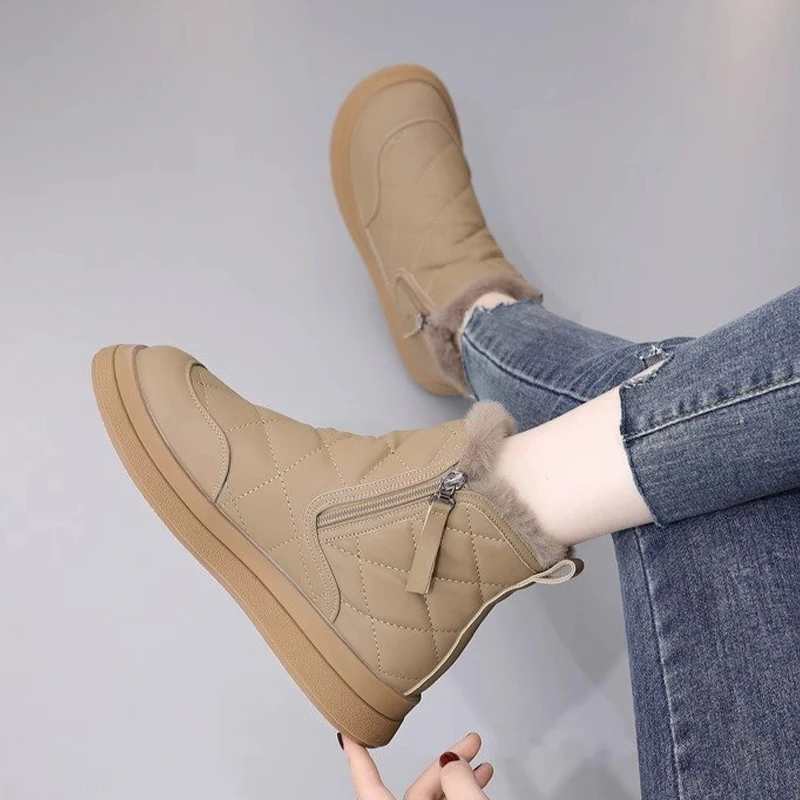 النساء الفراء الثلوج الأحذية الدافئة أحذية قطنية الشقق حذاء رياضة الشتاء أحذية بوت قصيرة 2025 جديد الرياضة احذية الجري ريترو تشيلسي أحذية امرأة