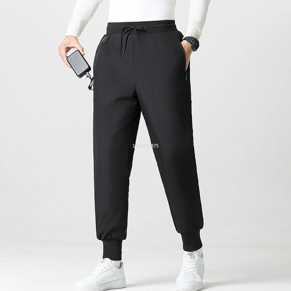 กางเกงกันหนาวแบบให้ความร้อนสำหรับผู้ชายและผู้หญิง 8 จุด กางเกงอุ่นไฟฟ้าอัจฉริยะ กางเกงเดินป่ากันหนาว เสื้อแจ็คเก็ตเดินป่ากันหนาว