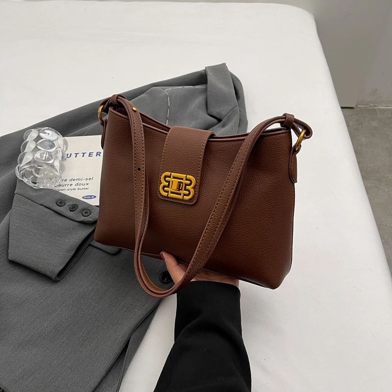 Wysokiej klasy uniwersalna torba na ramię - elegancki, niszowy, modny design pasujący do słodkich, retro, codziennych i modnych stylizacji dziewczęcych.