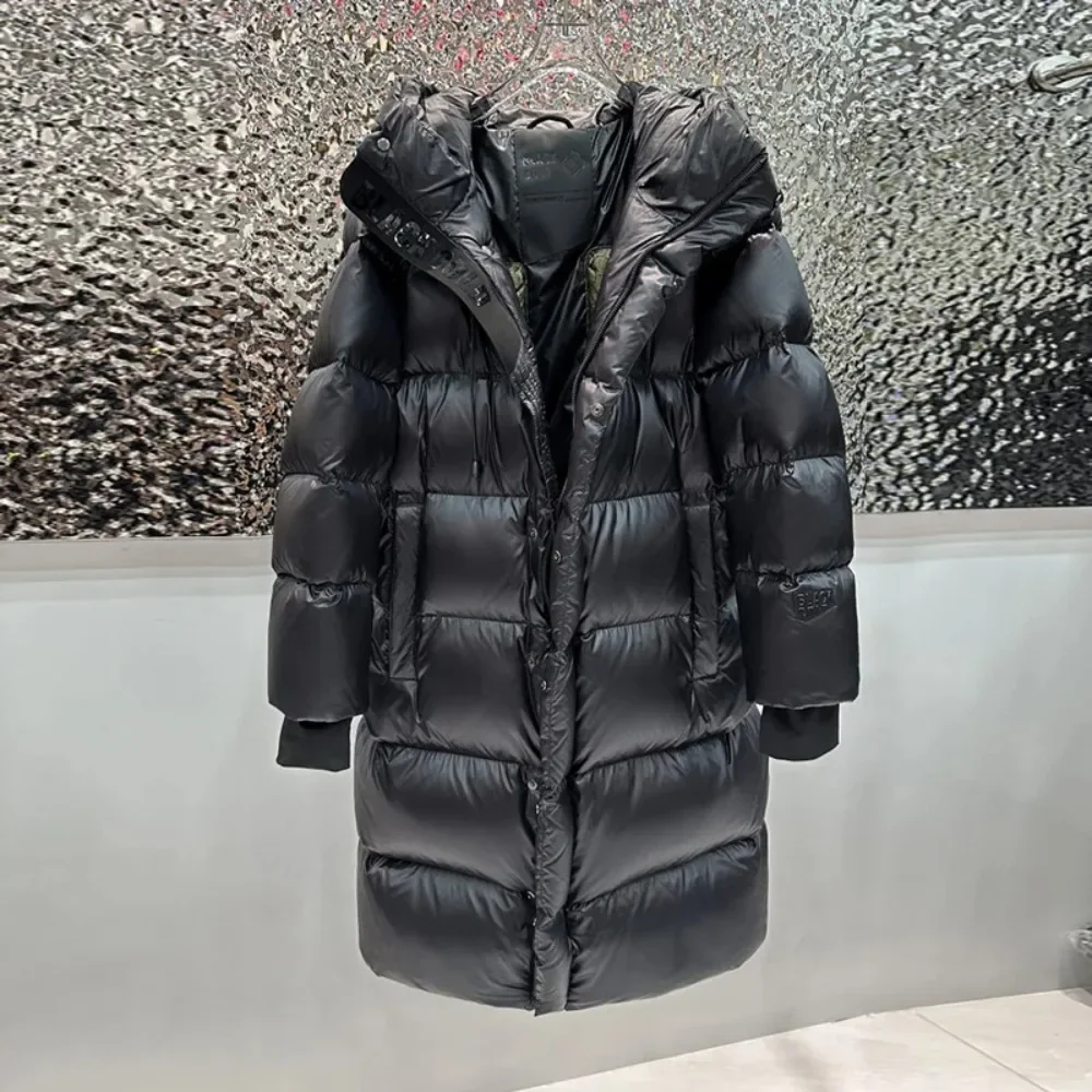 معطف خفيف بقلنسوة طويل بطة أسفل معطف دافئ للنساء سميك 2025 شتاء جديد فضفاض أسود اللون سميك سبعة شبكة قابلة للفصل سترة نسائية