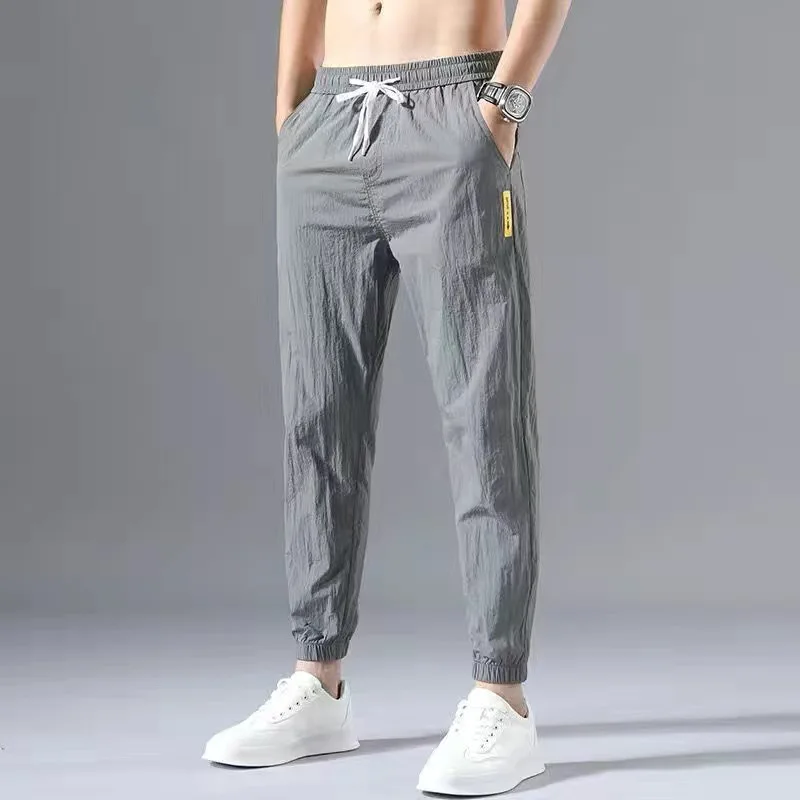 2024 Ice Shreds Men Summer Thin Style Trend Solid Color Loose Casual Motion Quick Drying Harun Bound Feet Large Size Trousers