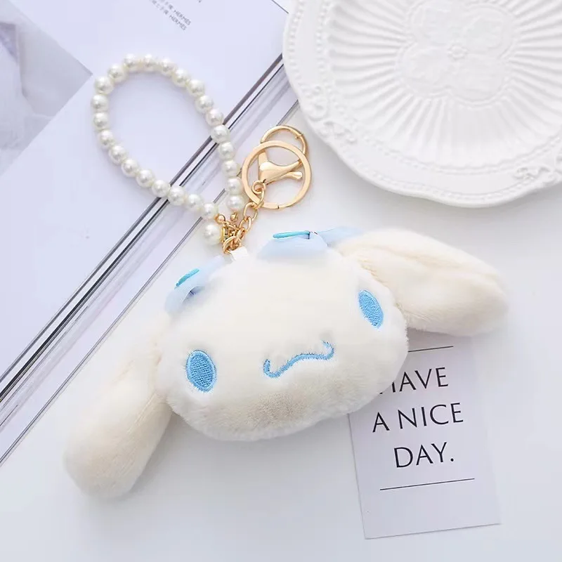 Sanrioed Cinnamoroll Melody Kuromi พวงกุญแจตุ๊กตาการ์ตูนน่ารักยัดไส้พวงกุญแจไข่มุก plushie ของเล่นวันเกิดของขวัญคริสต์มาส