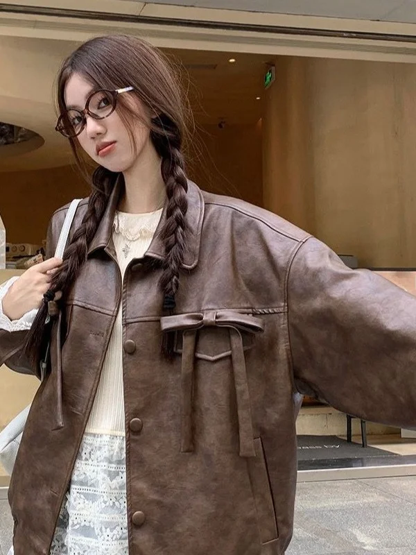 Cappotto da motociclista allentato da donna in pelle PU con nodo retrò americano Jaet dolce e fresco autunno inverno