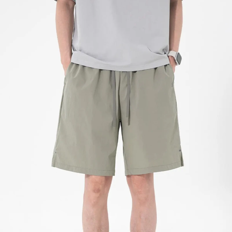

Men's Quick Dry Shorts Lightweight Breathable Cooling Summer Shorts Side Slit Hem Reflective Logo Loose Fit Sports Shorts
