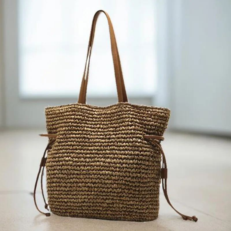 The New Straw bag large capacity one-shoulder 2024 new drawstring hook woven bagwoven bag female seaside vacation beach bag