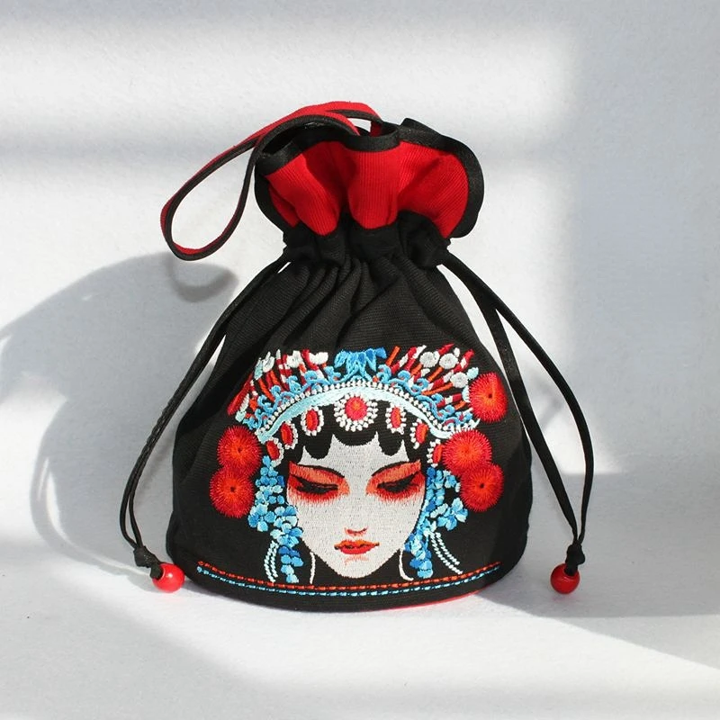 Original ethnic embroidery hand-held slung special cotton bag to study abroad, visit relatives and friends and trade gifts.