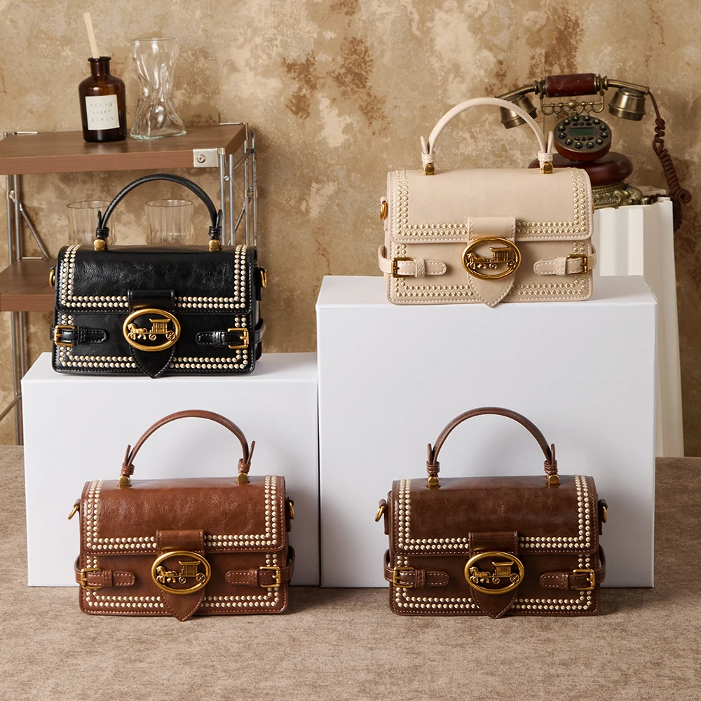 The new 2026 fashionable and trendy retro handbag for women, made of high-end materials, can be carried either cross-body or on