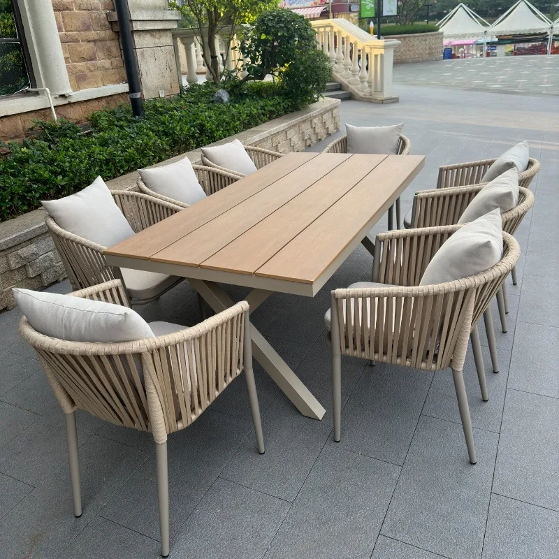 

Outdoor courtyard villa open-air garden combination rattan chair waterproof sun protection Internet celebrity dining table