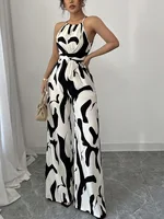 Novedad de verano de gama alta, mono retro versátil con cordones en la cintura, adelgazante, estampado, cuello colgante para mujer