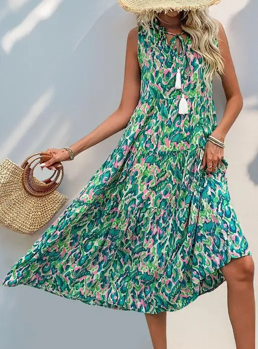 فستان صيفي جديد بدون أكمام ورقبة على شكل حرف V وطباعة تجريدية للنساء فستان كاجوال فضفاض لقضاء عطلة الشاطئ بدون أكمام