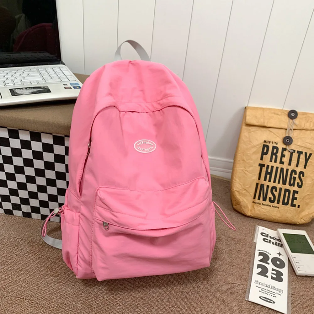 

Ежедневный рюкзак унисекс с сетчатыми карманами. Повседневная школьная сумка с регулируемым ремешком. Однотонная легкая нейлоновая сумка для занятий спортом для отдыха.