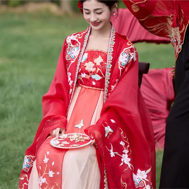 

Новый свадебный стиль Хан, вышитая юбка Hezi с большими рукавами, тяжелая промышленность, корона Феникса и красное платье, полный комплект