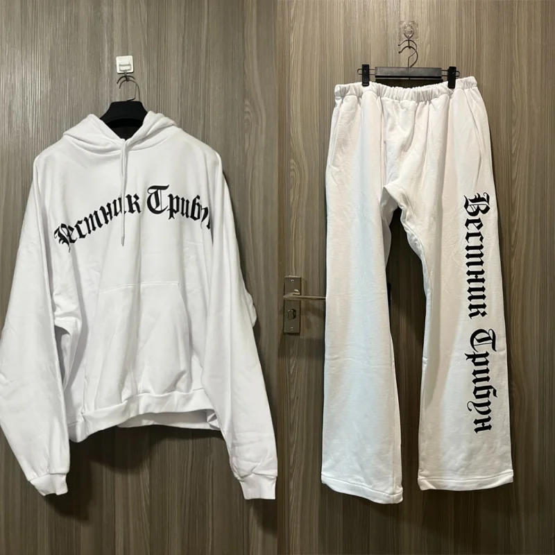 Modisches Kanye-Set mit Kapuzenpullover und Hose, schulterfrei, mit Buchstaben bedruckt, für Herren und Damen, gerades Jogginghose-Kapuzenpullover