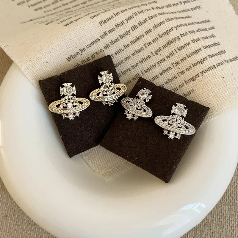 أقراط كوكب ثلاثية الأبعاد أنيقة وعصرية للنساء للتنقل متعددة الاستخدامات بتصميم كلاسيكي فاخر ومجوهرات للأذن #1